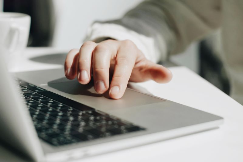 man at laptop checking mail